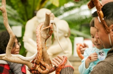 dad daughter looking at snake