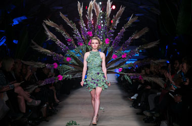 fleurotica 2019 runway shot of melinda whitmore peacock dress